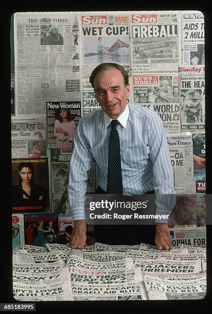 Publishing magnate Rupert Murdoch with sample newspapers and magazines put out by his international conglomerate at the offices of the New York Post....