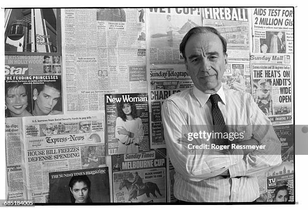 Publishing magnate Rupert Murdoch with sample newspapers and magazines put out by his international conglomerate at the offices of the New York Post....