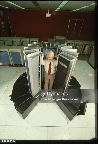 Computer Engineer Posing in a Cray Supercomputer