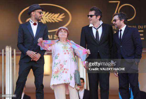 French artist and photographer JR, French director Agnes Varda, French singer/composer Matthieu Chedid a.k.a M and French director Mathieu Demy pose...