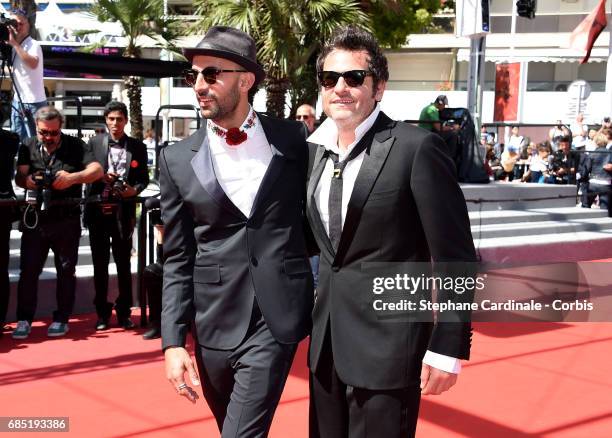 Director JR and composer Matthieu Chedid attend the "Faces, Places " screening during the 70th annual Cannes Film Festival at Palais des Festivals on...