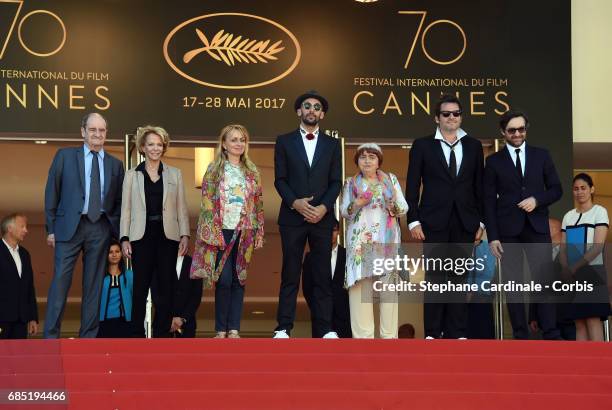 Frederique Bredin , Directors JR, Agnes Varda, composer Matthieu Chedid and members of the cast pose as they attend the "Faces, Places " screening...