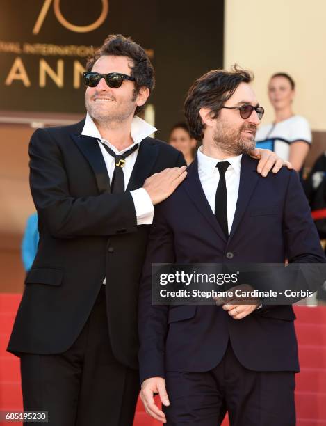 Matthieu Chedid and a friend attend the "Faces, Places " premiere during the 70th annual Cannes Film Festival at Palais des Festivals on May 19, 2017...