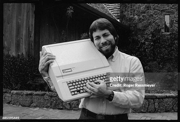Steve Wozniak holds an Apple IIe, a variation on his Apple II. Both machines sold very well. | Location: near Santa Cruz, California, USA.