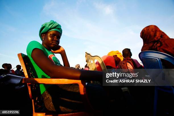 South Sudanese refugees take reading lessons at the UNHCR camp of al-Algaya in Sudan's White Nile state, south of Khartoum, on May 17, 2017. More...