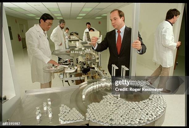 Robert Swanson, founder and CEO of Genentech, a biotechnology companie, poses in the Genentech labs.