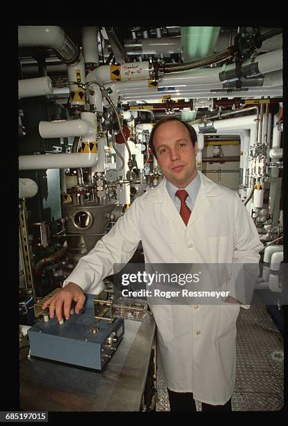 Robert Swanson, founder and CEO of Genentech, a biotechnology companie, poses in the Genentech labs.
