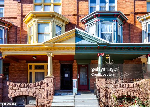 colourful row houses - charles village, baltimore. - baltimore maryland daytime stock pictures, royalty-free photos & images