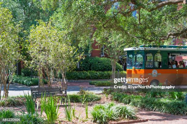 savannah, georgia street scene - trolley bus stock pictures, royalty-free photos & images