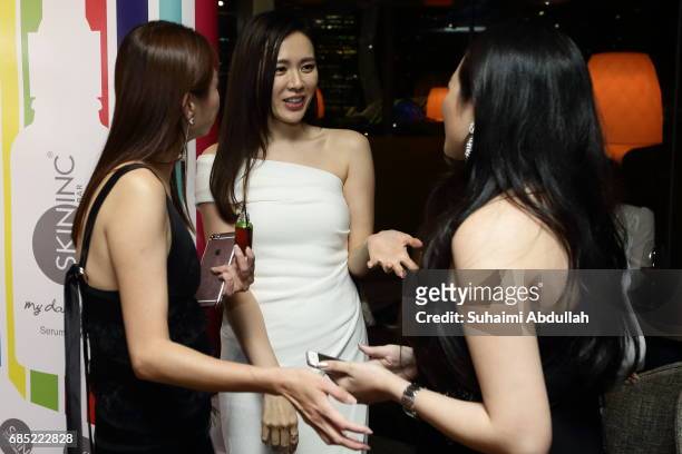 Korean actress, Son Ye-Jin mingles with Sabrina Tan , CEO and Founder of Skin Inc. And a guest during a private cocktail function at the Aura Sky...