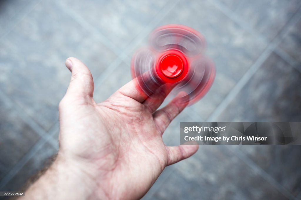 Red fidget spinner