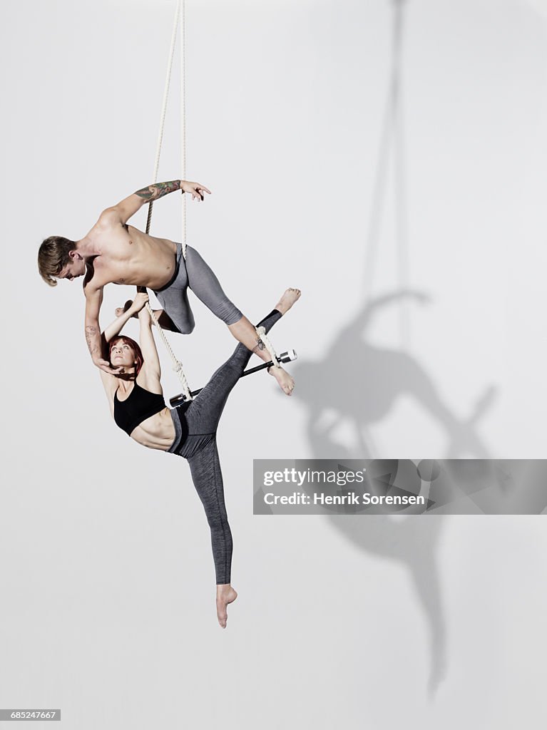 Circus artists in Trapeze