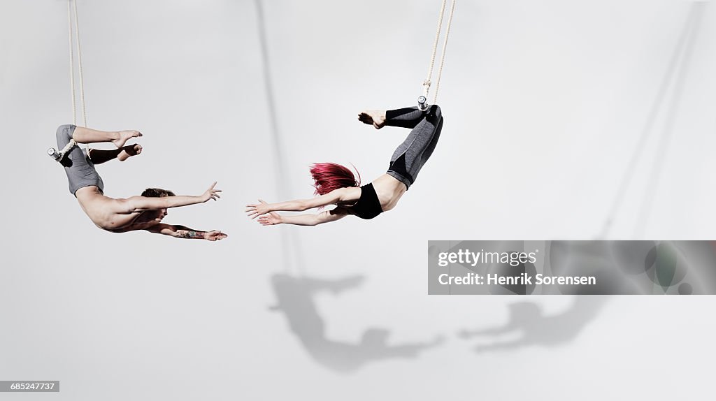 Circus artists in Trapeze