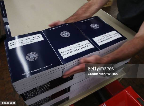Copies of President Trump's FY'18 budget books are stacked, at the Government Publishing Office, on May 19, 2017 in Washington, DC.