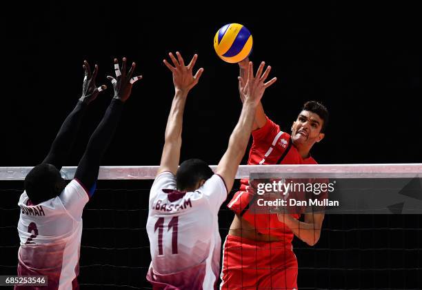 Mohamed Al Hachdadi of Morocco spikes the ball in the Mens Volleyball Group B match between Qatar and Morocco during day eight of Baku 2017 - 4th...