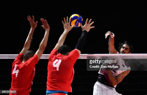 Mubarak Hammad of Qatar spikes the ball in the Mens Volleyball Group B match between Qatar and Morocco during day eight of Baku 2017 - 4th Islamic...