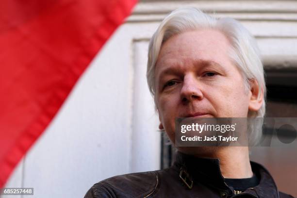 Julian Assange speaks to the media from the balcony of the Embassy Of Ecuador on May 19, 2017 in London, England. Julian Assange, founder of the...