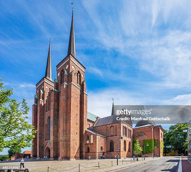 brick gothic roskilde cathedral - brick cathedral stock pictures, royalty-free photos & images
