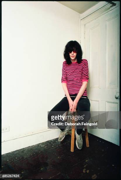 Deborah Feingold/Corbis via Getty Images) NEW YORK Lead singer for the The Ramones, musician, Joey Ramone poses for a portrait in 1983 in New York...