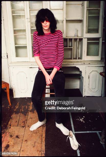Deborah Feingold/Corbis via Getty Images) NEW YORK Lead singer for the The Ramones, musician, Joey Ramone poses for a portrait in 1983 in New York...