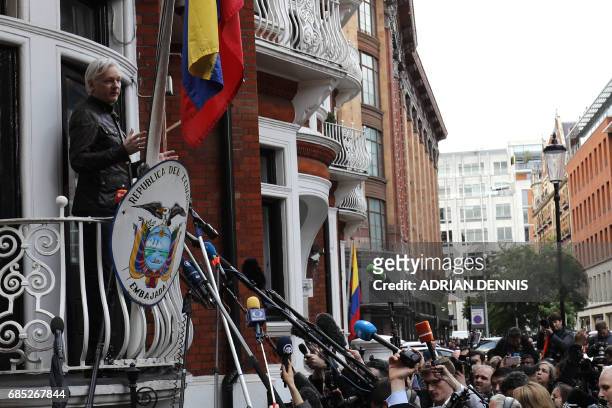Wikileaks founder Julian Assange appears on the balcony of the Embassy of Ecuador in London on May 19, 2017. Ecuador urged Britain today to "grant...