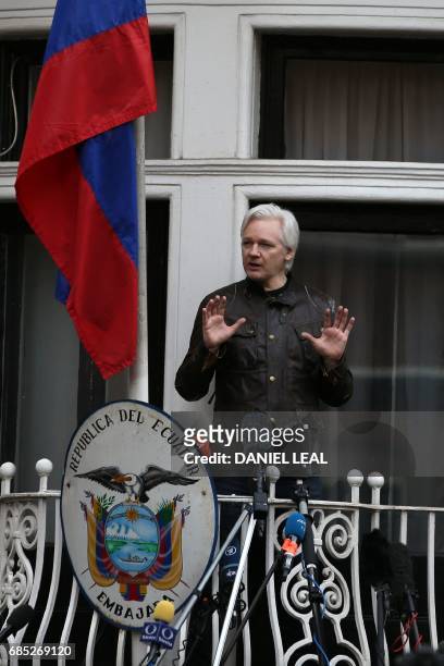Wikileaks founder Julian Assange speaks on the balcony of the Embassy of Ecuador in London on May 19, 2017. - Ecuador urged Britain today to "grant...
