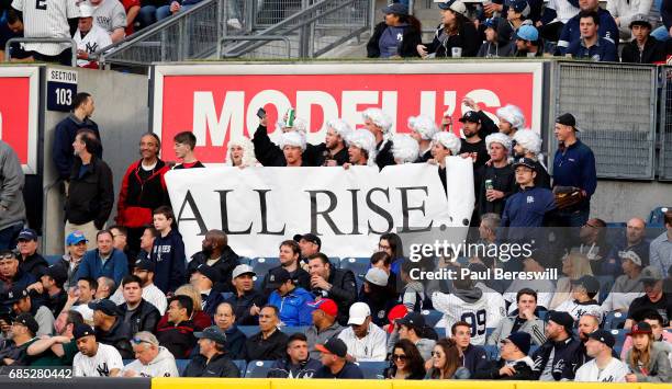 May 11: Fans of Aaron Judge of the New York Yankees stand up dressed as judges to cheer Aaron judge when he comes to bat in an MLB baseball game...