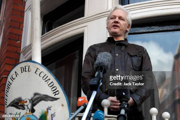 Julian Assange speaks to the media from the balcony of the Embassy Of Ecuador on May 19, 2017 in London, England. Julian Assange, founder of the...