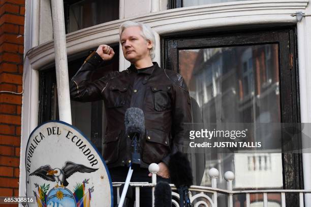 Wikileaks founder Julian Assange speaks on the balcony of the Embassy of Ecuador in London on May 19, 2017. - Ecuador urged Britain today to "grant...