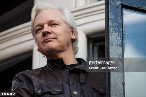 Julian Assange steps out to speak to the media from the balcony of the Embassy Of Ecuador on May 19, 2017 in London, England. Julian Assange, founder...