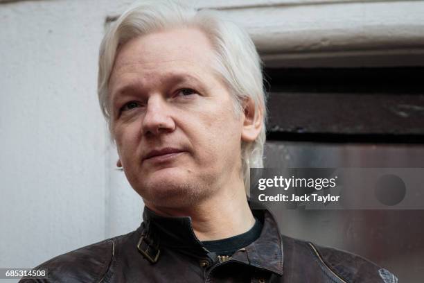 Julian Assange speaks to the media from the balcony of the Embassy Of Ecuador on May 19, 2017 in London, England. Julian Assange, founder of the...