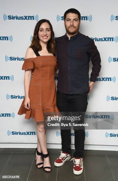 Zoe Lister-Jones and Adam Pally visit the SiriusXM Studios on May 19, 2017 in New York City.