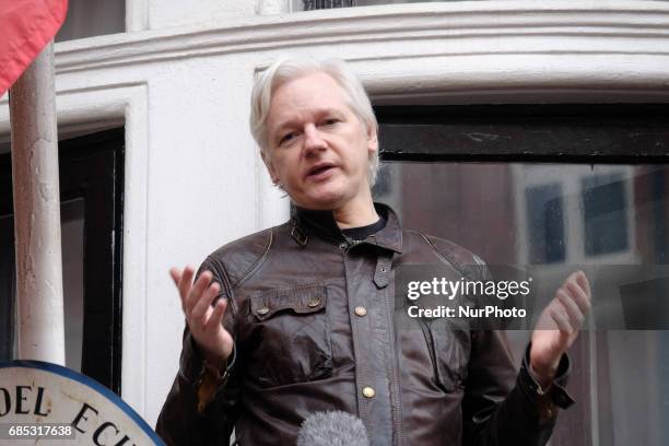 Julian Assange speaks to the media from the balcony of the Embassy Of Ecuador on May 19, 2017 in London, England. Julian Assange, founder of the...