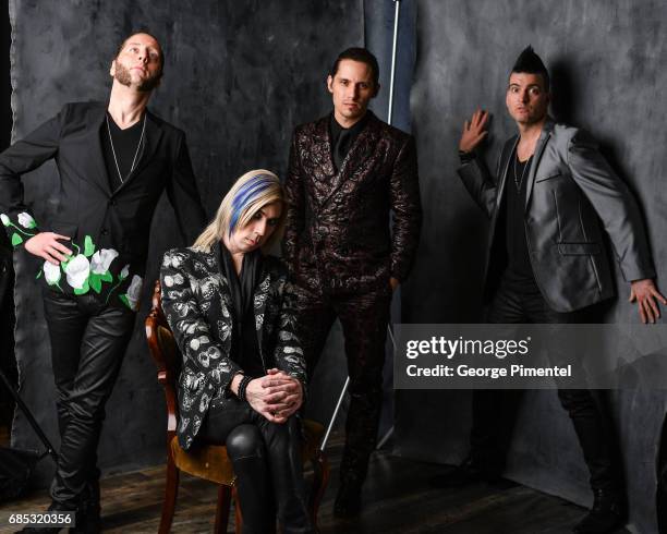 Ian Casselman, Josh Ramsay, Matt Webb and Mike Ayley of Marianas Trench pose at the 2017 Juno Awards Portrait Studio at the Canadian Tire Centre on...