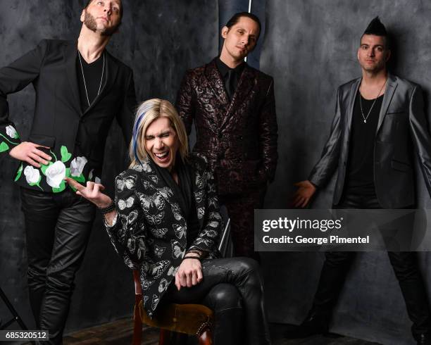 Ian Casselman, Josh Ramsay, Matt Webb and Mike Ayley of Marianas Trench pose at the 2017 Juno Awards Portrait Studio at the Canadian Tire Centre on...