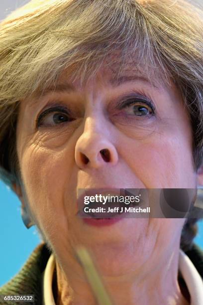 Britains's Prime Minister Theresa May gestures as she gives a speech at the launch of the Scottish manifesto on May 19, 2017 in Edinburgh, Scotland....