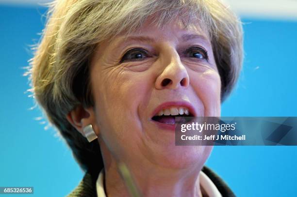 Britains's Prime Minister Theresa May gestures as she gives a speech at the launch of the Scottish manifesto on May 19, 2017 in Edinburgh, Scotland....