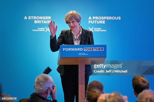 Britains's Prime Minister Theresa May gestures as she gives a speech at the launch of the Scottish manifesto on May 19, 2017 in Edinburgh, Scotland....