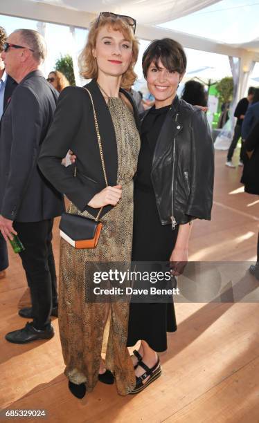 Jessica Swale and Gemma Arterton attend Focus Features' 15th Anniversary party at the Cannes Film Festival at Baoli Beach on May 19, 2017 in Cannes,...