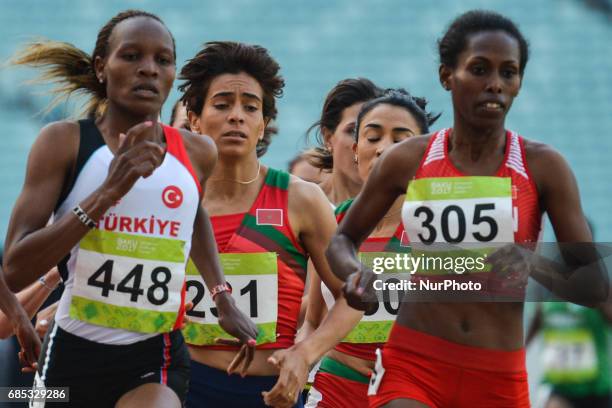 Meryem Akdag of Turkey, Rababe Arafi of Morocco and Tigist Gashaw of Bahrain lead ahead of the last laps in Women's 1500m final, during day four of...