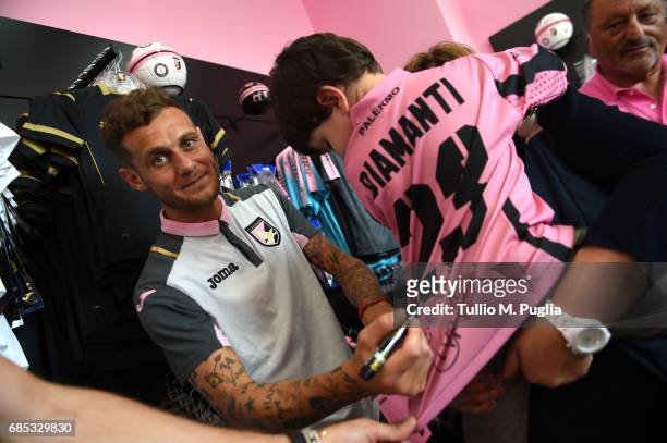 Andrea Rispoli and Alessandro Diamanti visit Club Store at Renzo Barbera Stadium on May 19, 2017 in Palermo, Italy.