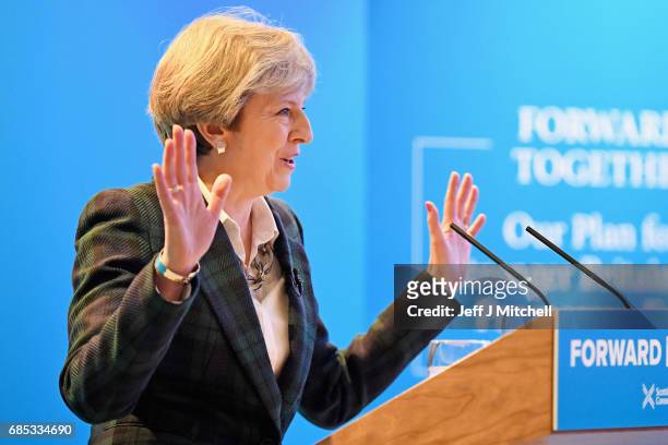 Prime Minister Theresa May gestures as she gives a speech at the launch of the Scottish manifesto on May 19, 2017 in Edinburgh, Scotland. The...