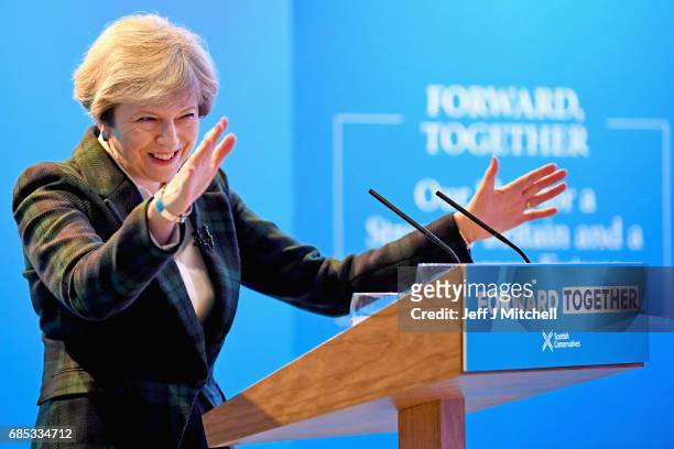 Prime Minister Theresa May gestures as she gives a speech at the launch of the Scottish manifesto on May 19, 2017 in Edinburgh, Scotland. The...