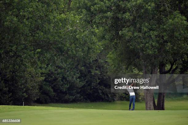 Ryo Ishikawa of Japan plays a shot on the sixth hole during Round Two of the AT&T Byron Nelson at the TPC Four Seasons Resort Las Colinas on May 19,...