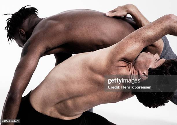 male dancers on white backdrop - semi dress stock pictures, royalty-free photos & images