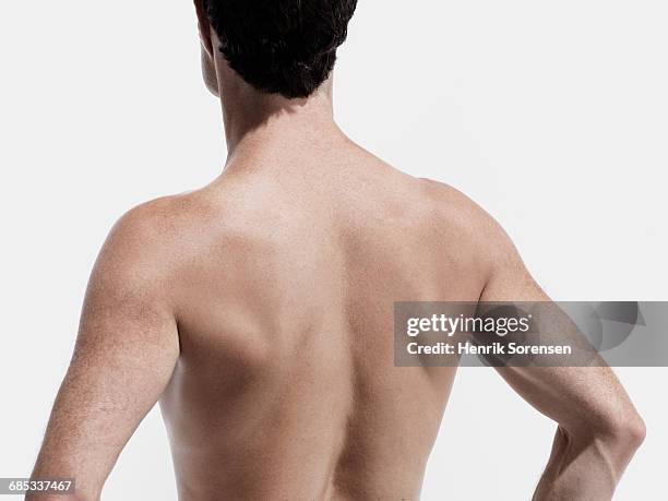 male dancer on white backdrop - dorso umano foto e immagini stock