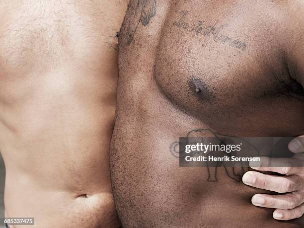 close up on male dancers - male torso stock pictures, royalty-free photos & images