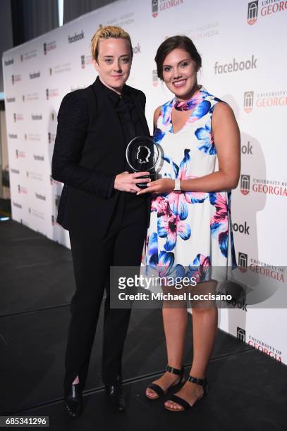 Kate Fisher accepts an award from Shelby Silverman on behalf of Her Story the Peabody-Facebook Futures Of Media Awards at Hotel Eventi on May 19,...