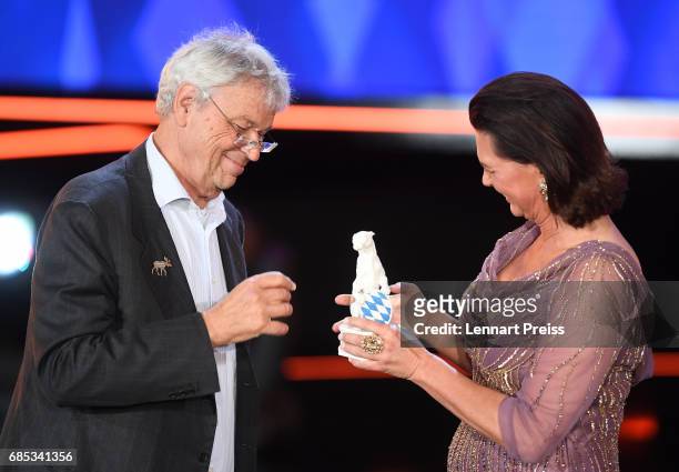 Bavarian state minister Ilse Aigner hands over the Honorary Award to Gerhard Polt during the Bayerischer Fernsehpreis 2017 show at...