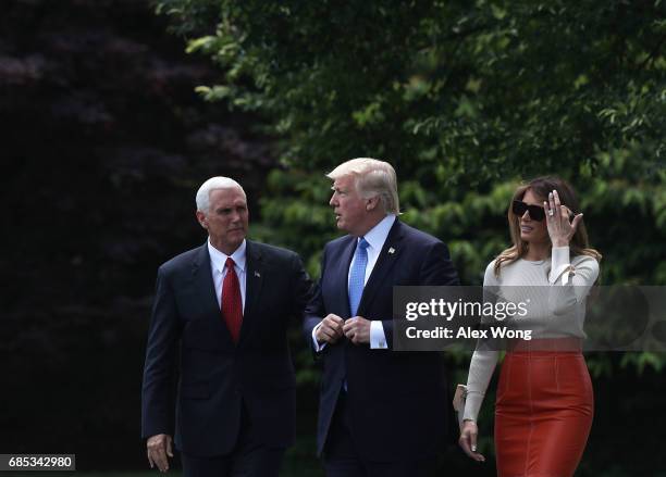 Vice President Mike Pence bids farewell to President Donald Trump and first lady Melania Trump prior to their departure from the White House May 19,...